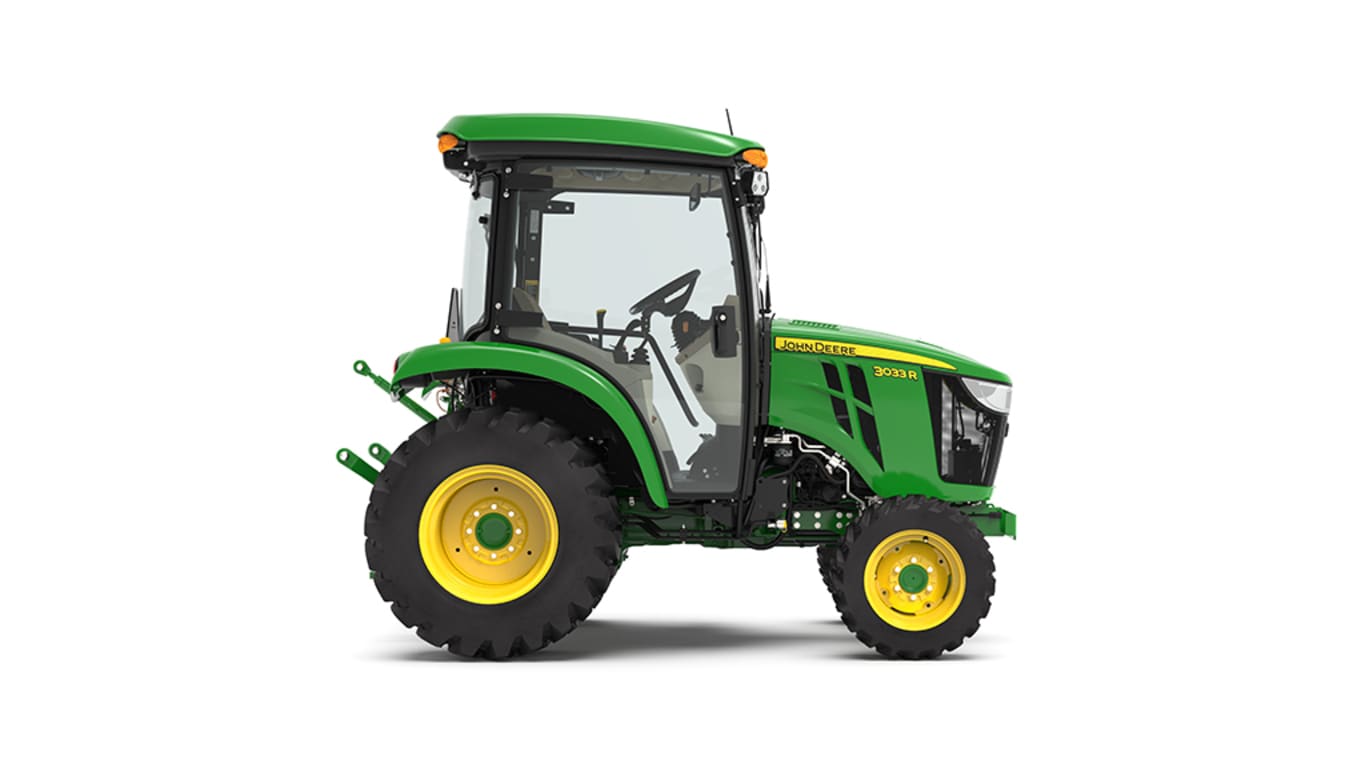 Tracteur compact 3033R vu de la droite sur fond blanc