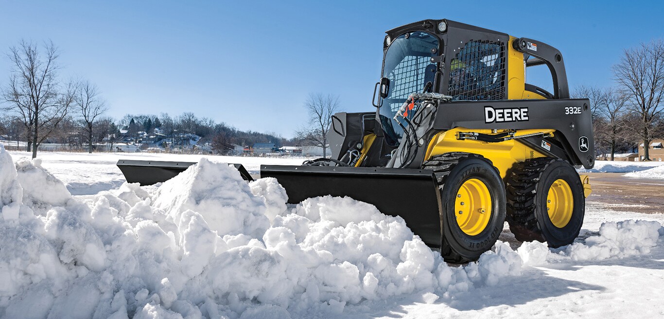 Skid Steer with snow blower attachment
