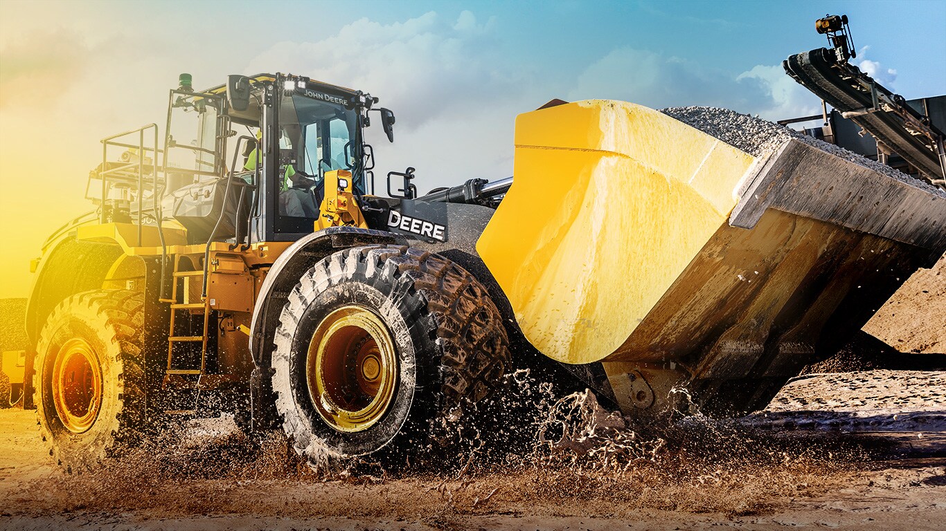 The 904 P-Tier Wheel Loader splashes through a puddle at the Lago Verde Mine in Florida.