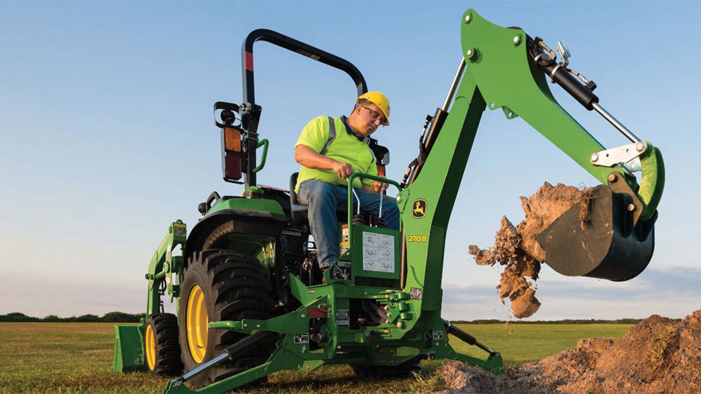 Ramassage de boue avec le tracteur 2038R