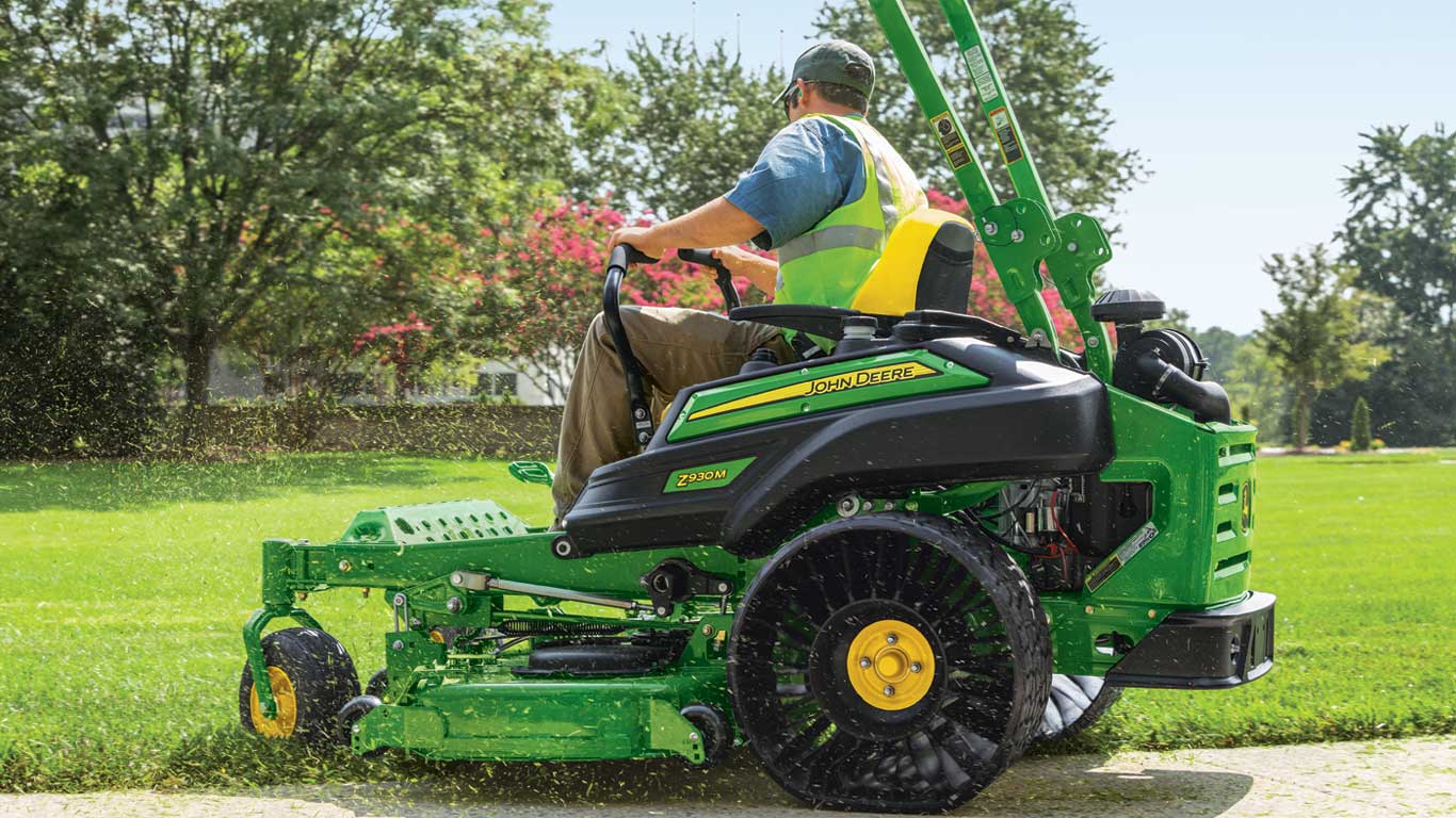 Man cutting grass with Z930M ZTrak™ mower.