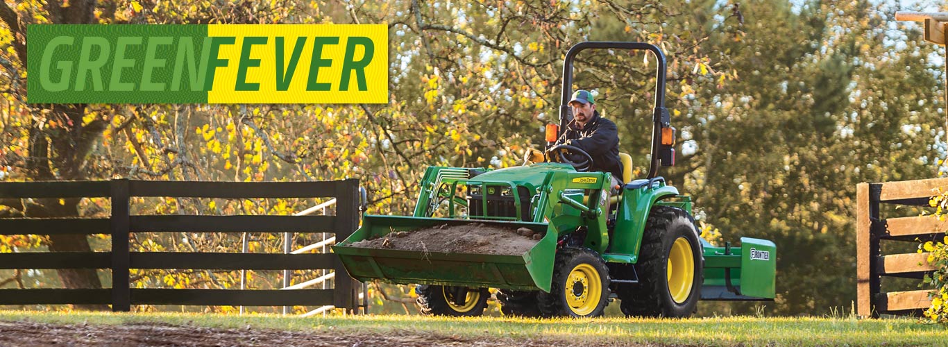 3032e tractor going through open fence