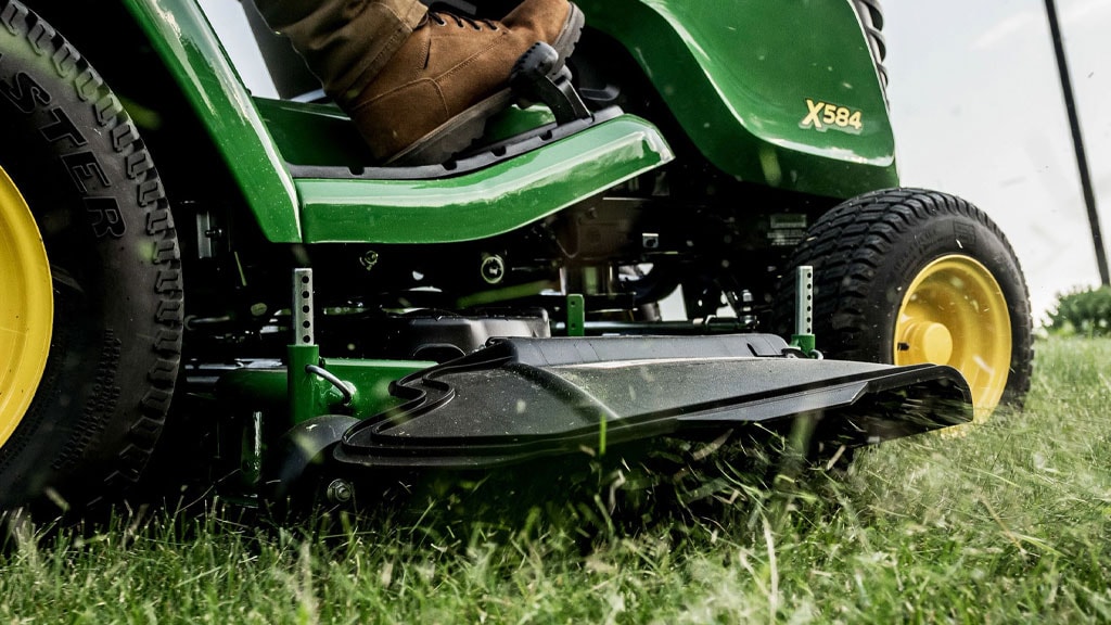 image of mulching system attached to lawn tractor