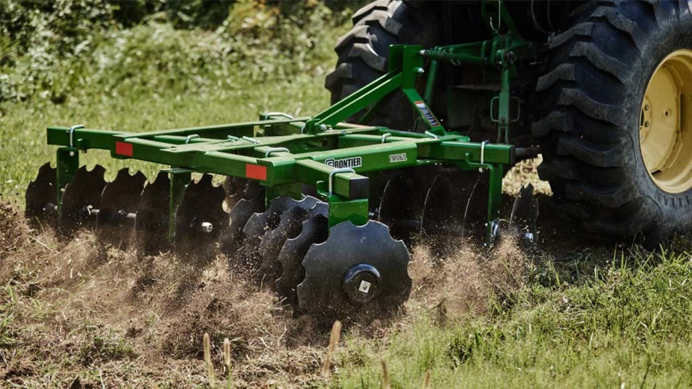 The Frontier TM1062L Tandem Disk Harrow in operation.