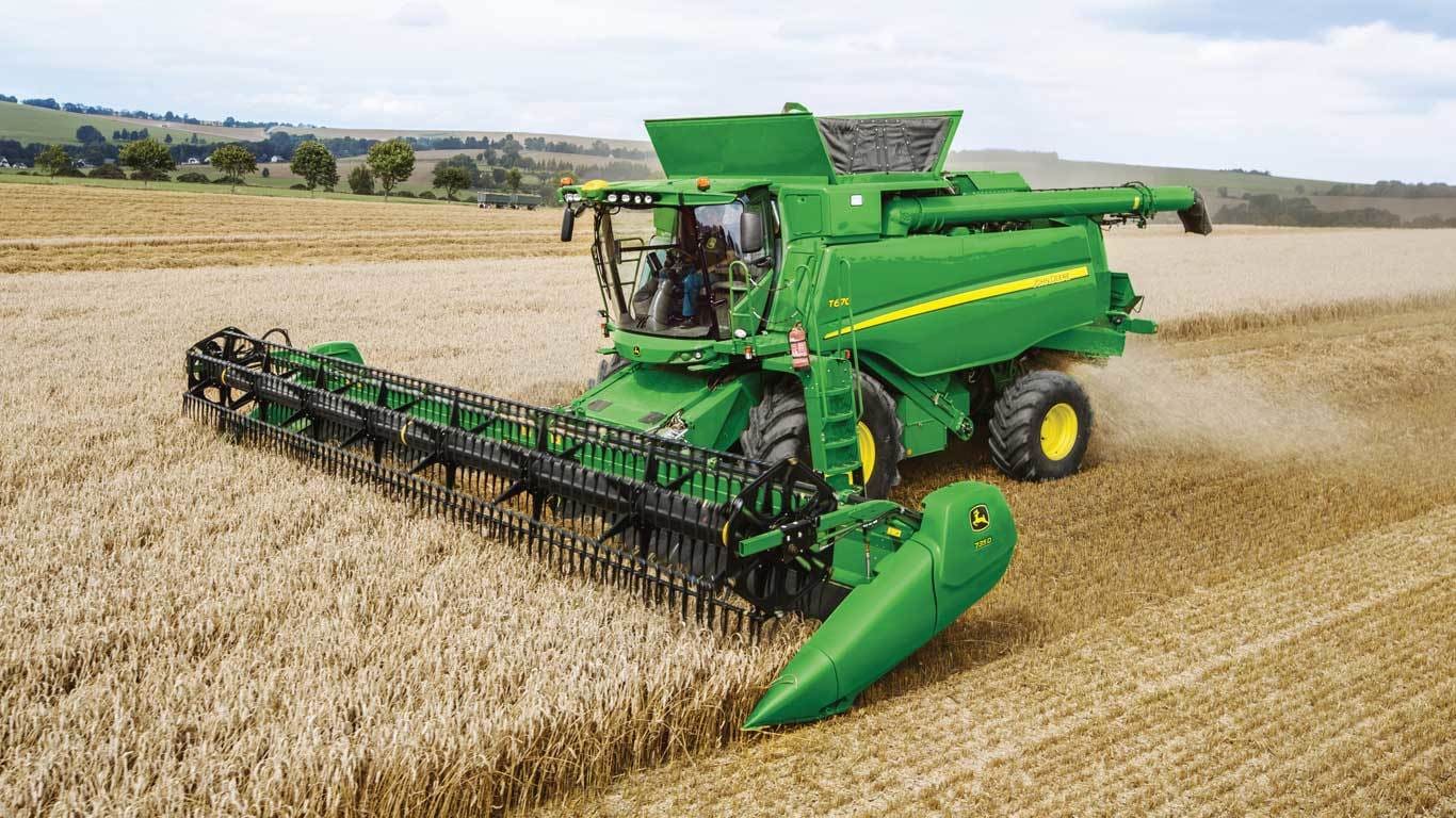 Photo of a T Series Combine harvesting small grains