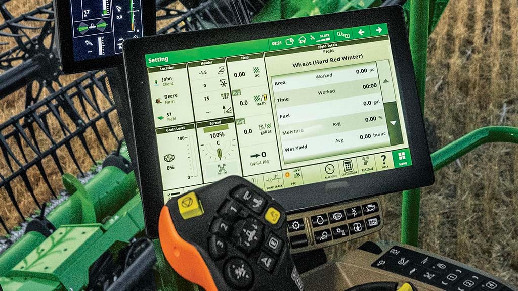 Photo gros plan d’un afficheur CommandCenter™ G5Plus intégré dans la moissonneuse-batteuse S7.