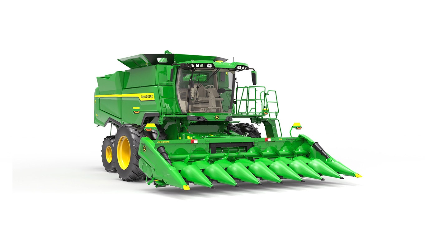 Photo d’une moissonneuse-batteuse S7 600 John Deere avec tête de coupe de tablier à toile, sur fond blanc.