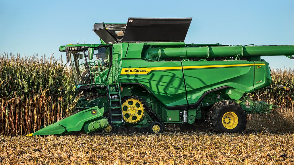 Photo of an X9 1000 harvesting corn