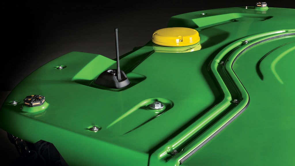 Photo du récepteur StarFire™ intégré monté sur la cabine d’une moissonneuse-batteuse X9 John Deere.