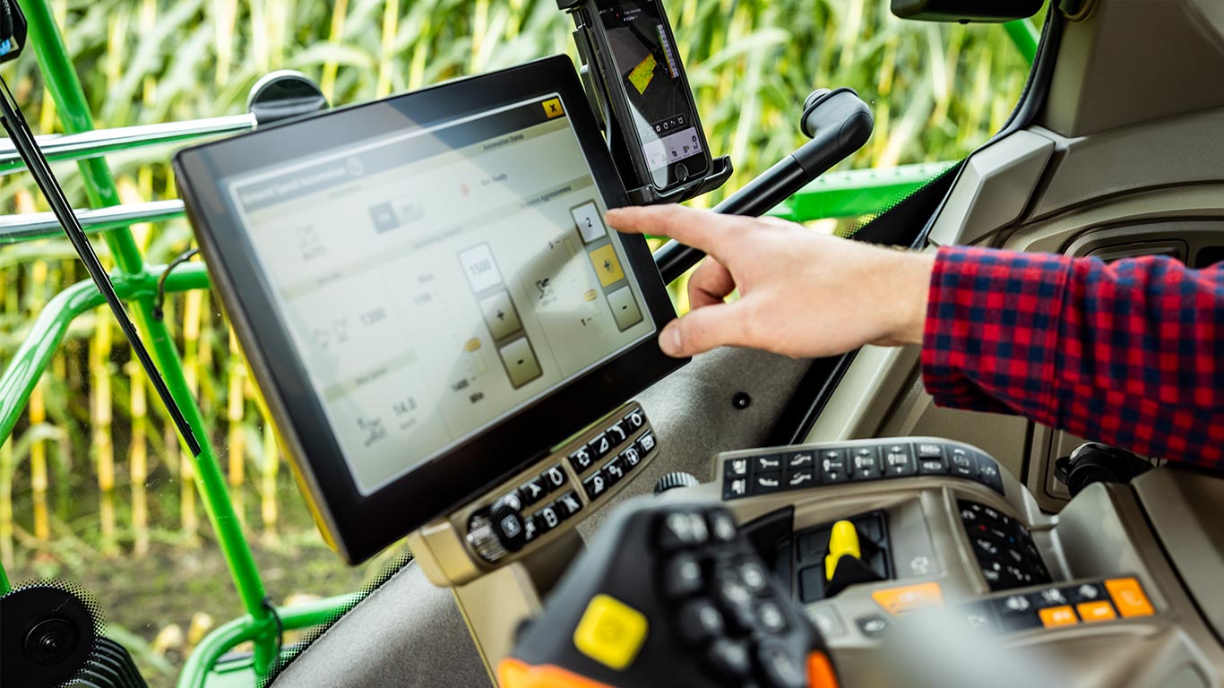 Person using the G5 screen in cab
