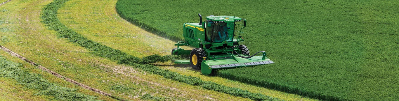 Hero image of a windrower in it's field