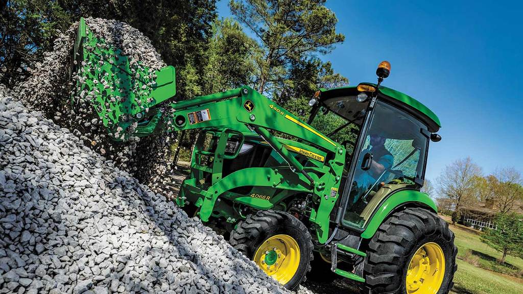 440R loader picking up rocks
