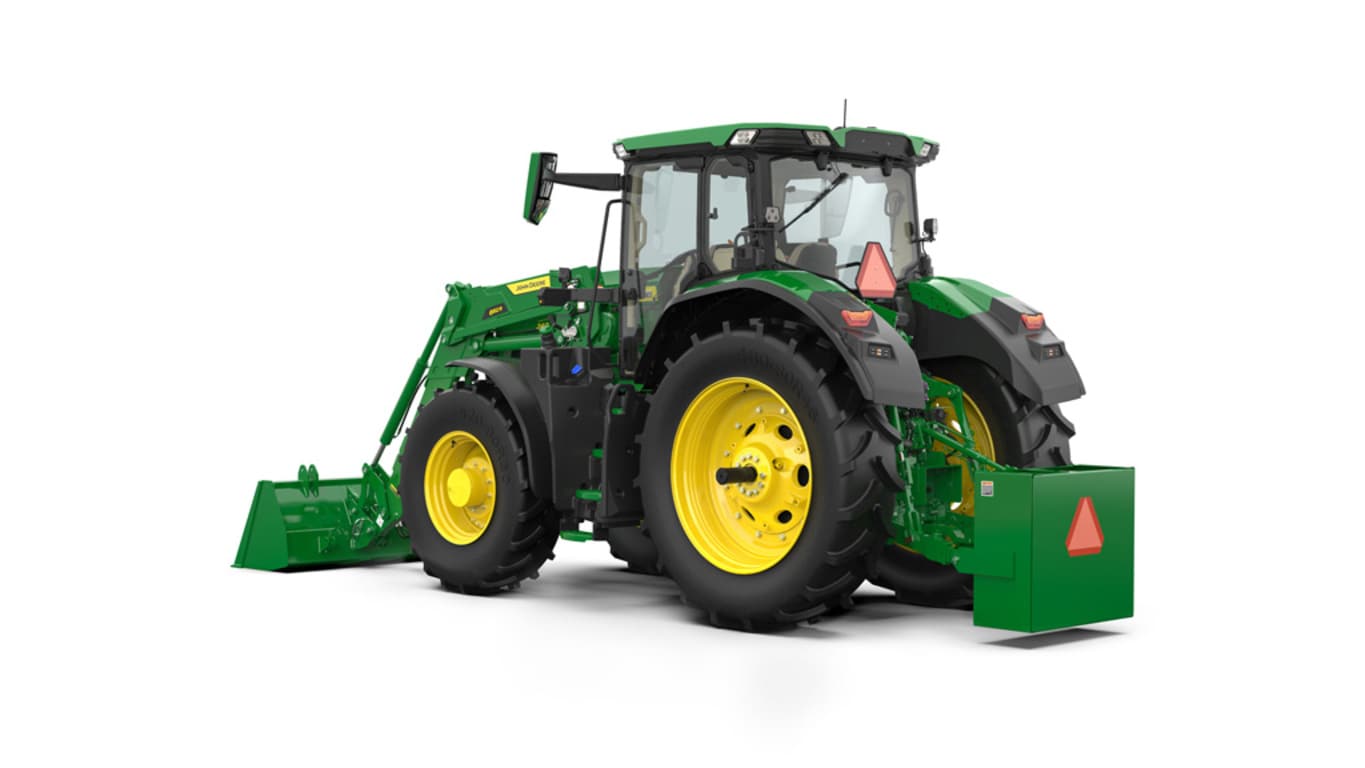 Image en studio arrière gauche d’un chargeur 662R monté sur un tracteur 6R 240