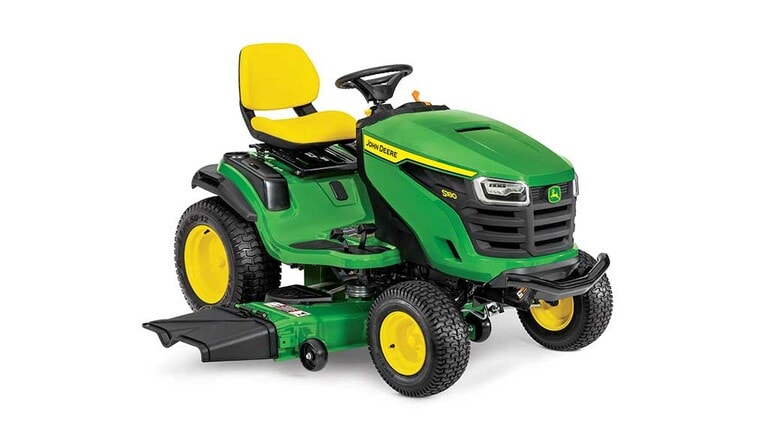 A front-right-facing green riding mower with a yellow seat and green mowing deck on a white background.