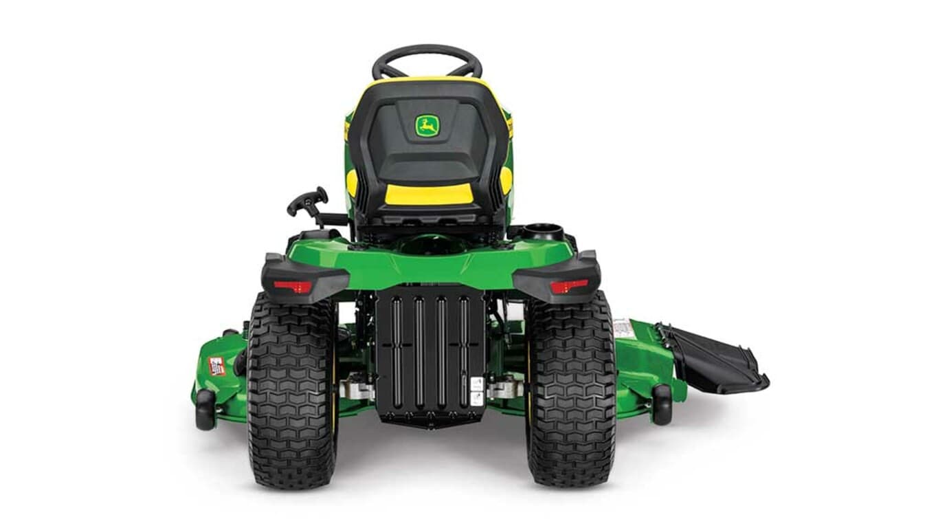 A backward-facing green riding mower with a yellow seat and green mowing deck on a white background.