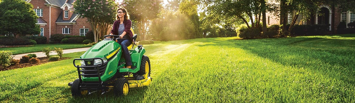 X500 Series Lawn Tractor mowing a yard