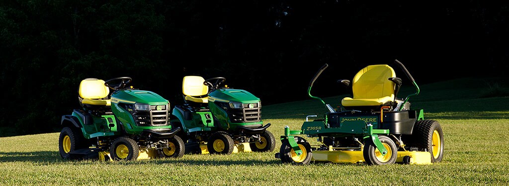 Photo lineup of lawn tractors and a zero-turn mower.