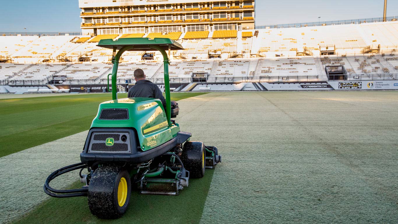 sports turf mower in stadium