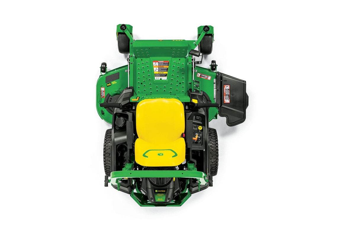 A top-down-facing studio shot of a green zero-turn mower on a white background.