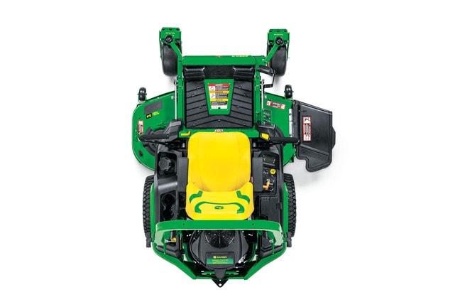 A top-down-facing studio shot of a green zero-turn mower on a white background.
