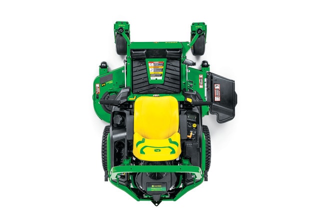 A top-down-facing studio shot of a green zero-turn mower on a white background.
