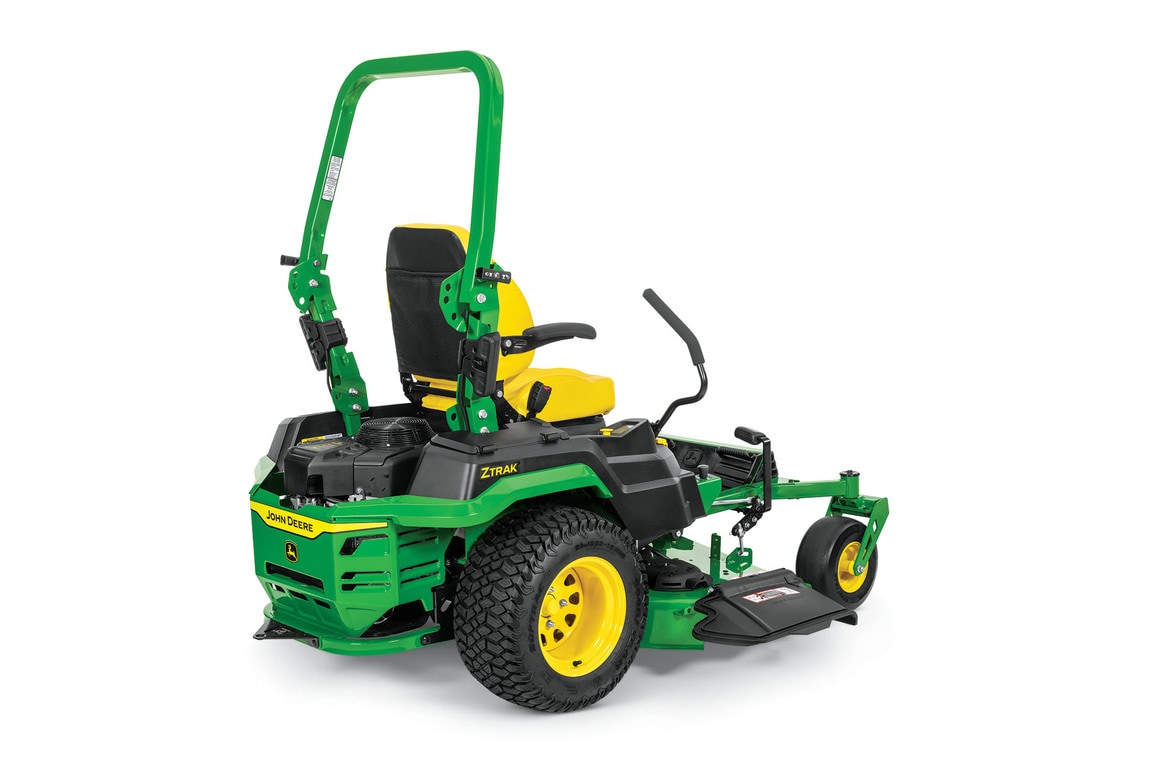 A rear-right-facing studio shot of a green zero-turn mower on a white background.