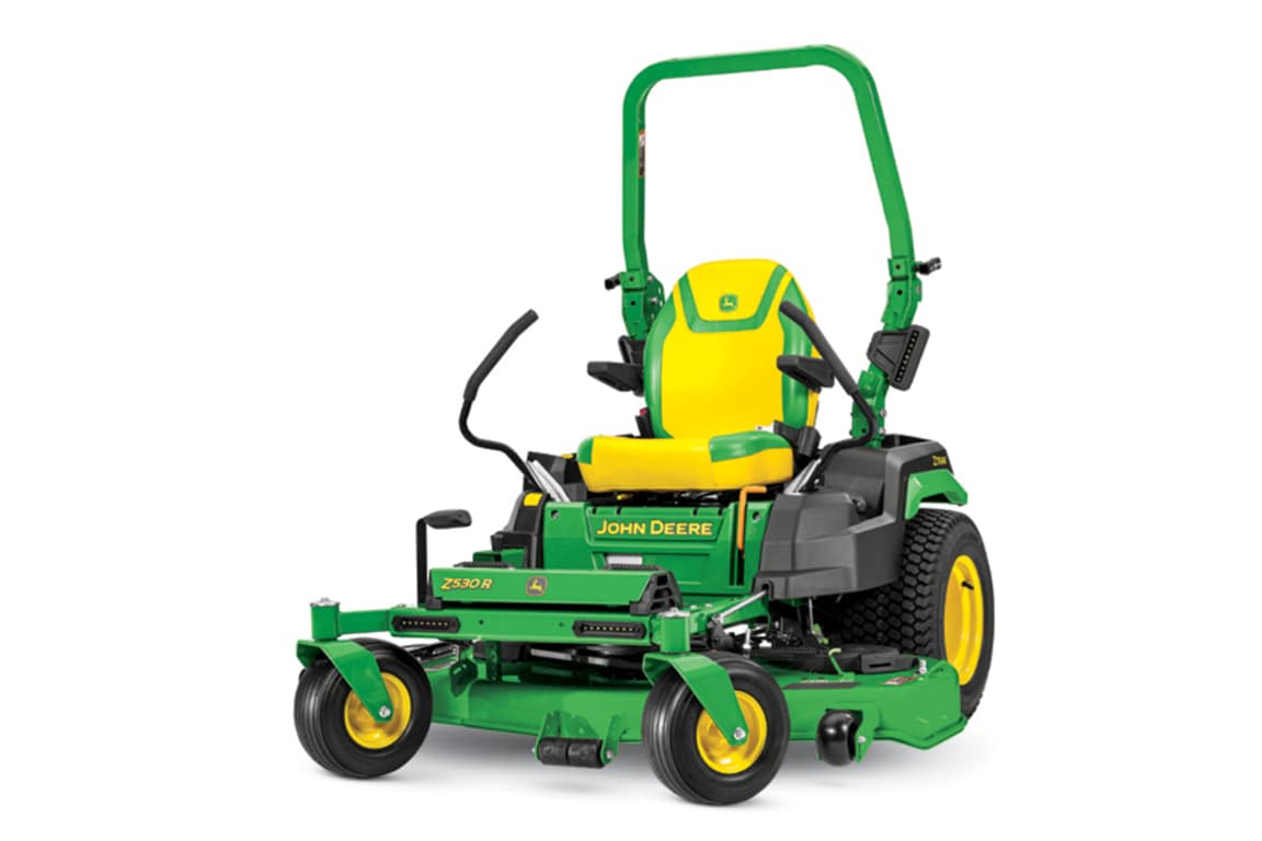 A front-left-facing studio shot of a green zero-turn mower on a white background.