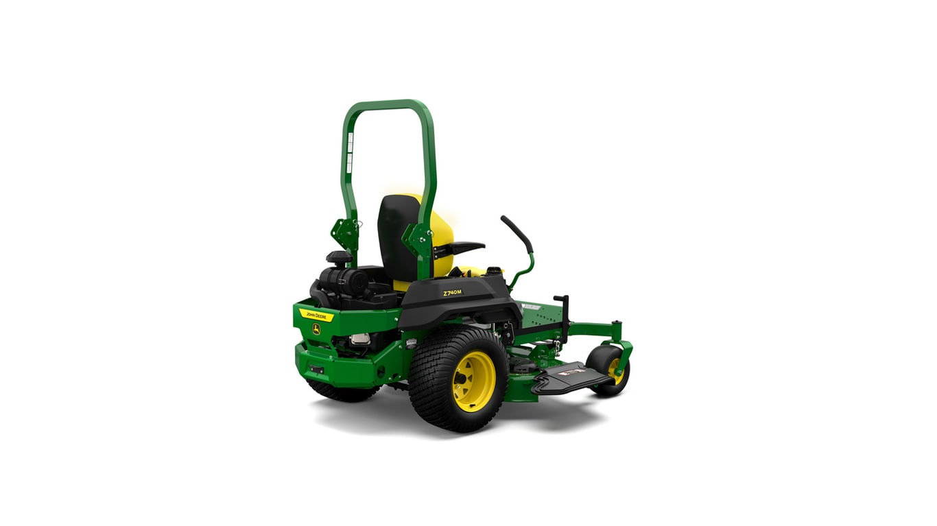 A rear-right-facing studio shot of a green zero-turn mower on a white background.