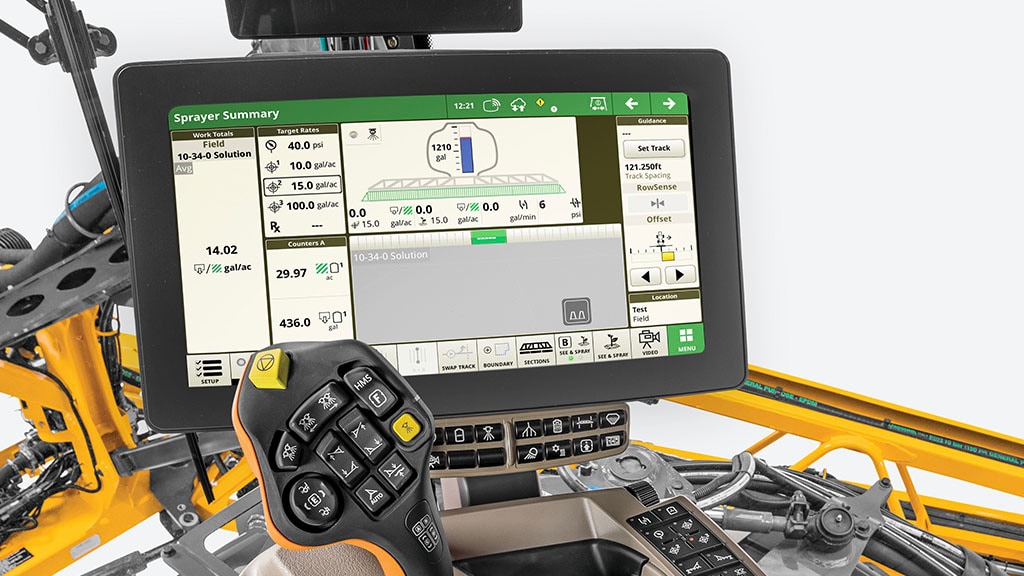 Afficheur CommandCenter G5 Plus dans la cabine d’un pulvérisateur Hagie.