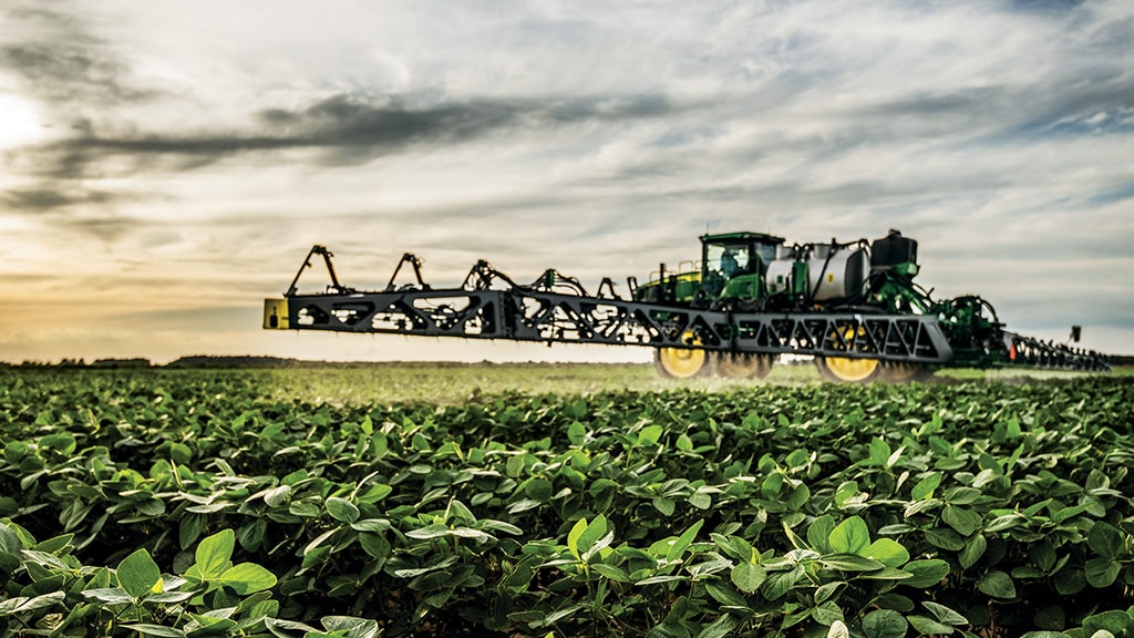 John Deere sprayer in soybean field
