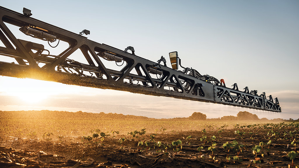 image of boom spraying in uneven terrain