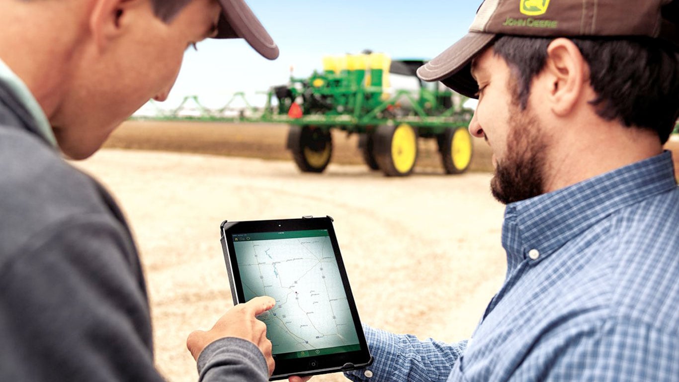 Connected Support image of men on digital device