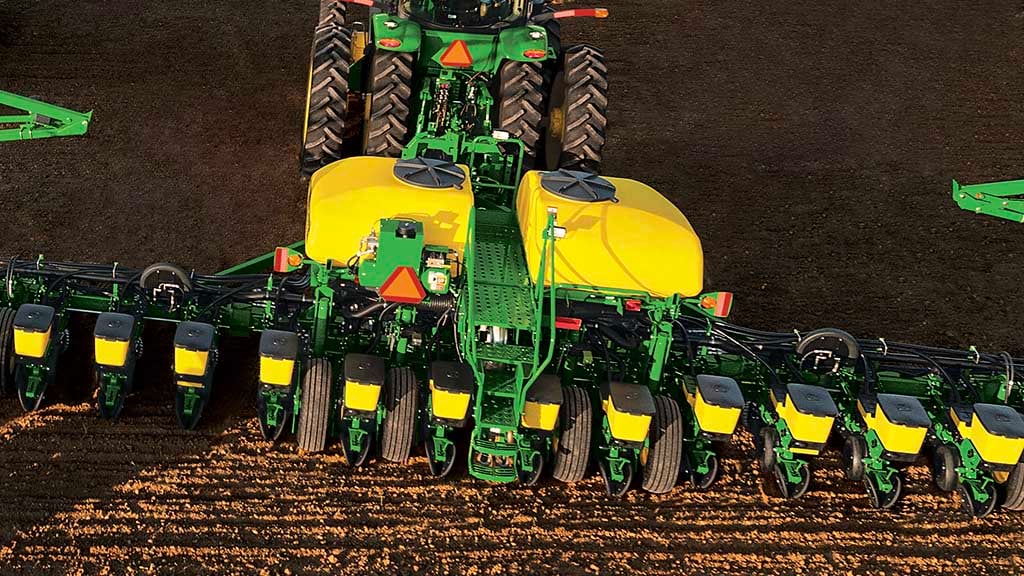 Overhead view of planting and turning in a tilled field