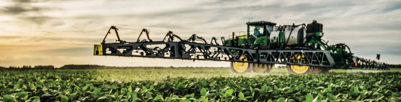 Sprayer operating in field.
