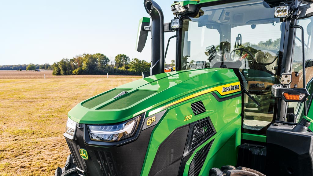 Front view of the large windshield and windows for a 6R tractor.