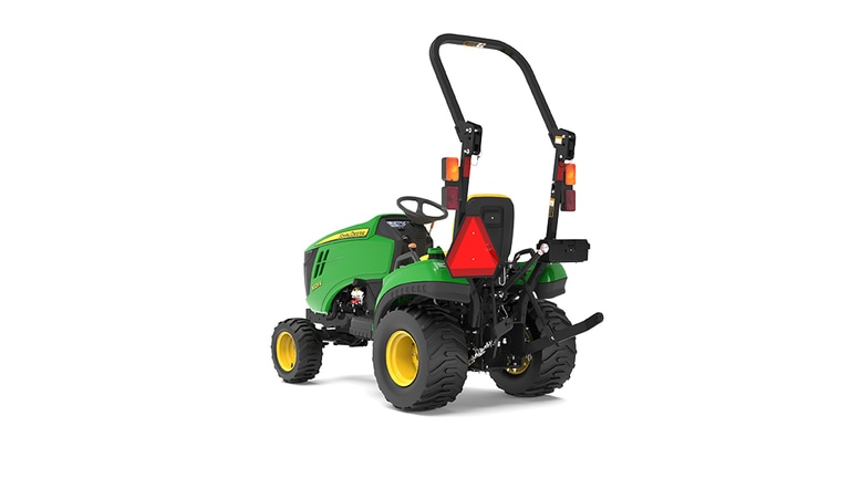 Vue arrière gauche du tracteur compact 1023E.
