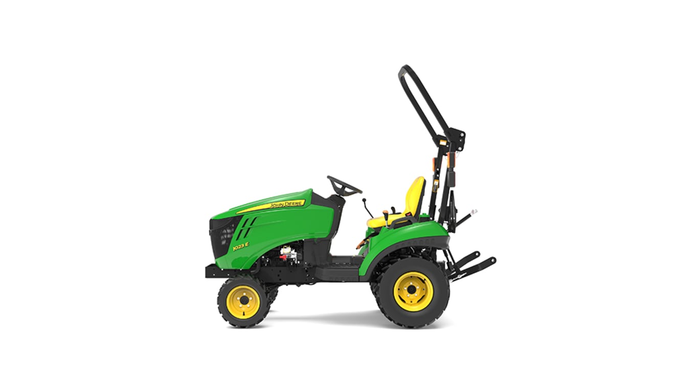 Vue latérale du tracteur compact 1023E.