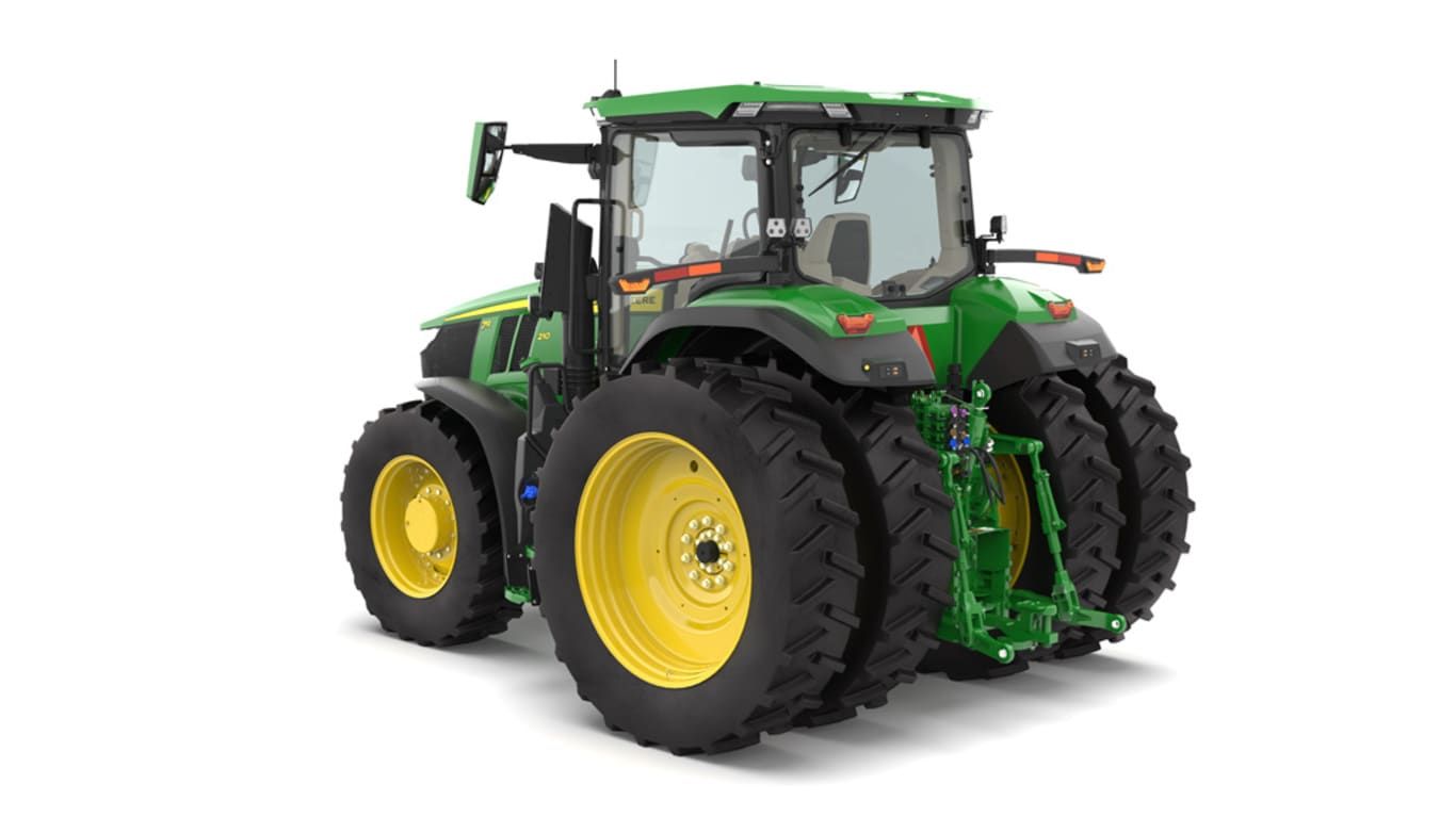 Photo studio sur fond blanc d'une tracteur 7R 210 vue de l'arrière gauche