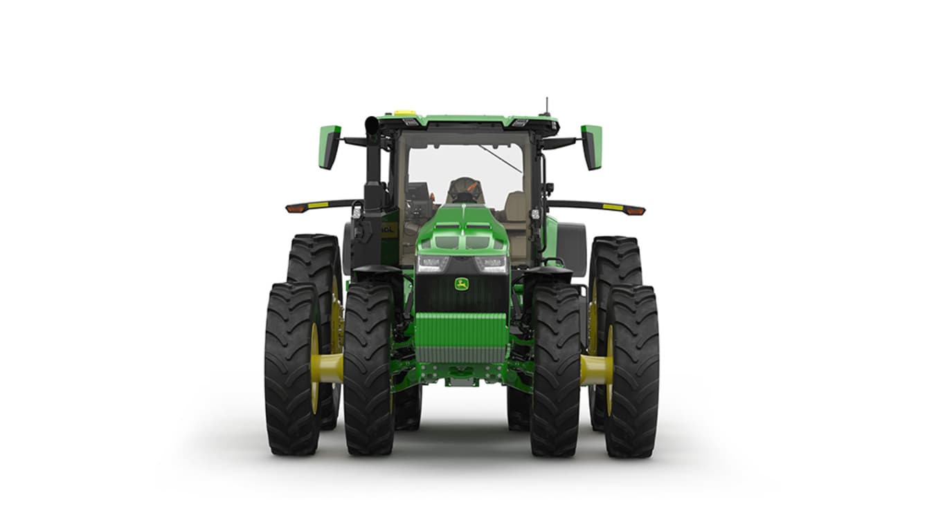 Front-facing studio shot of a 16-wheeled green tractor on a white background.