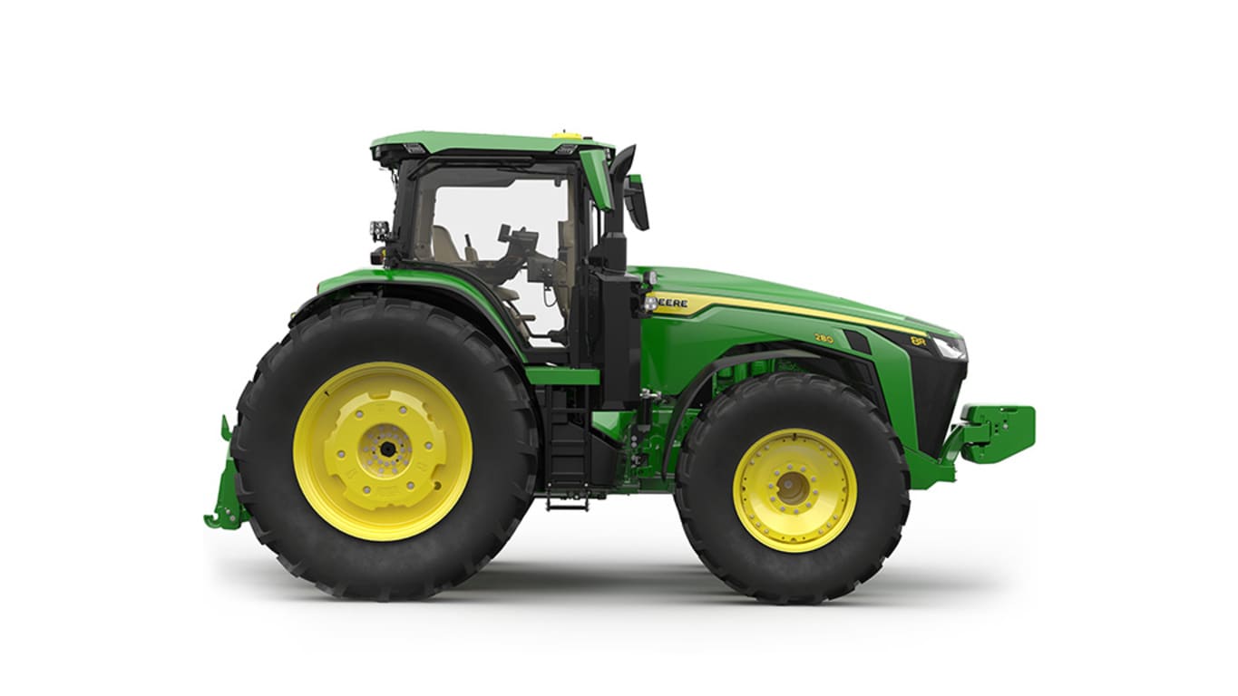 Right-facing studio shot of a 16-wheeled green tractor on a white background.