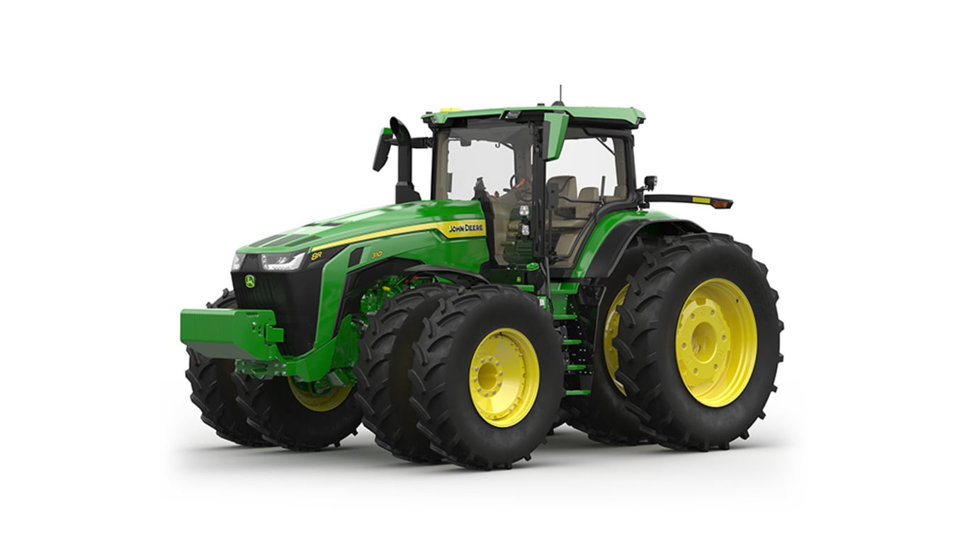 Image studio d'un tracteur vert à 16 roues vu de l'avant gauche sur fond blanc.