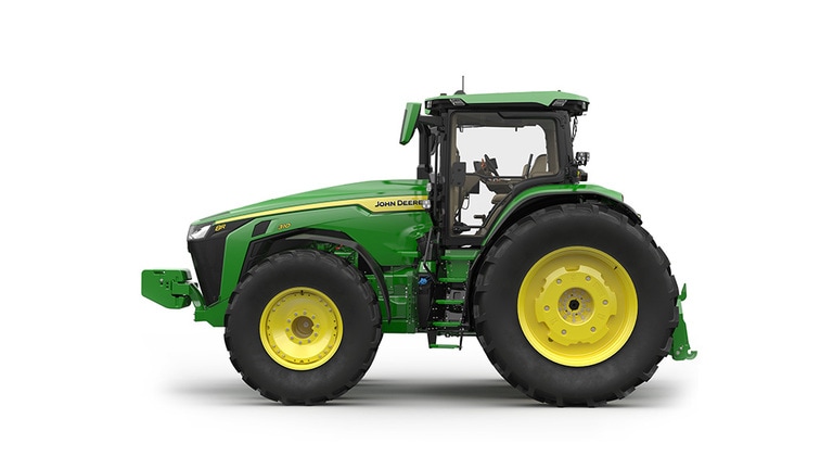 Image studio d'un tracteur vert à 16 roues vu de la gauche sur fond blanc.