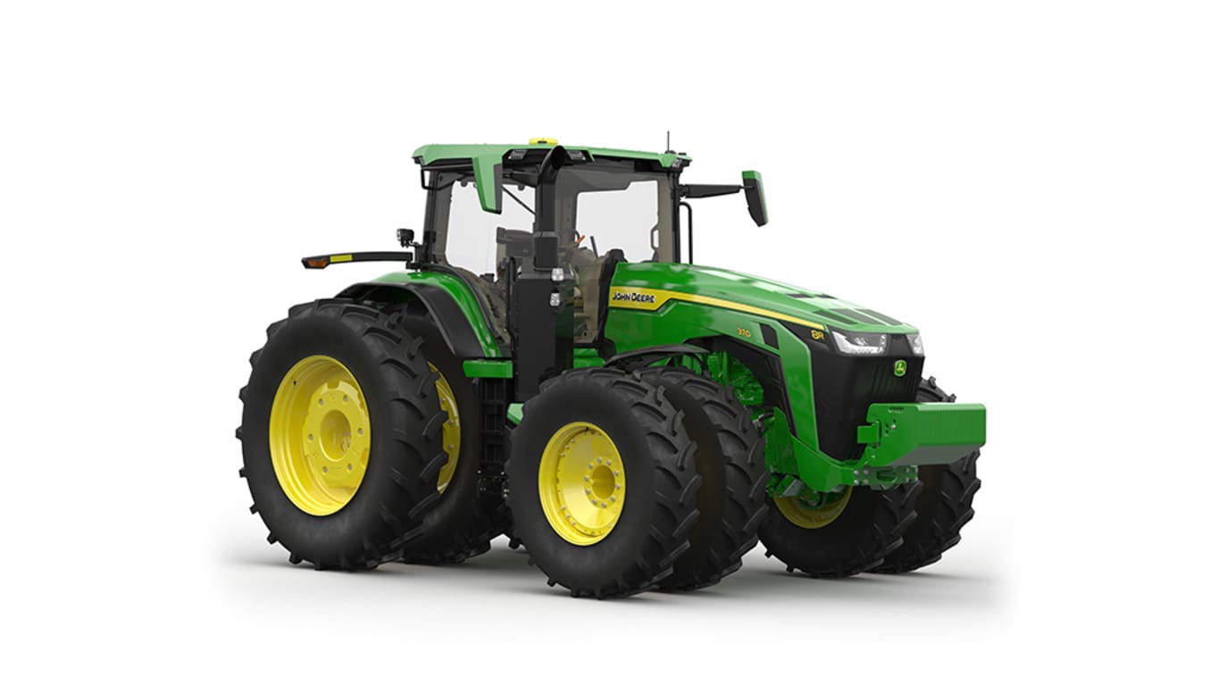 Image studio&nbsp;d'un tracteur vert&nbsp;à 16 roues vu de l'avant droit sur fond blanc.