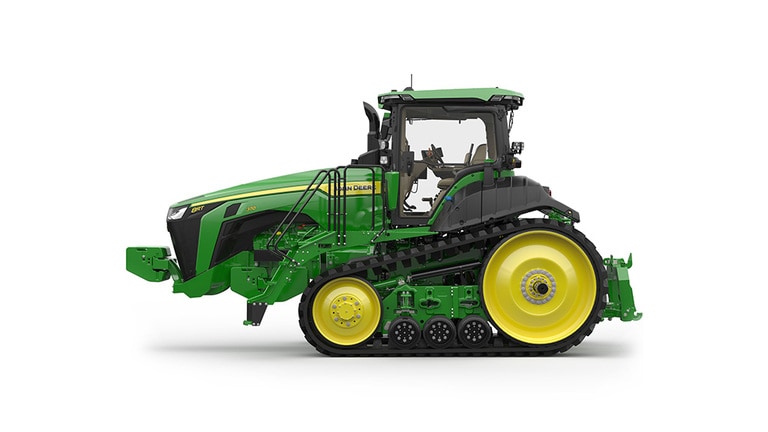 Image studio d'un tracteur vert à&nbsp;2&nbsp;chenilles vu de la gauche sur fond blanc.
