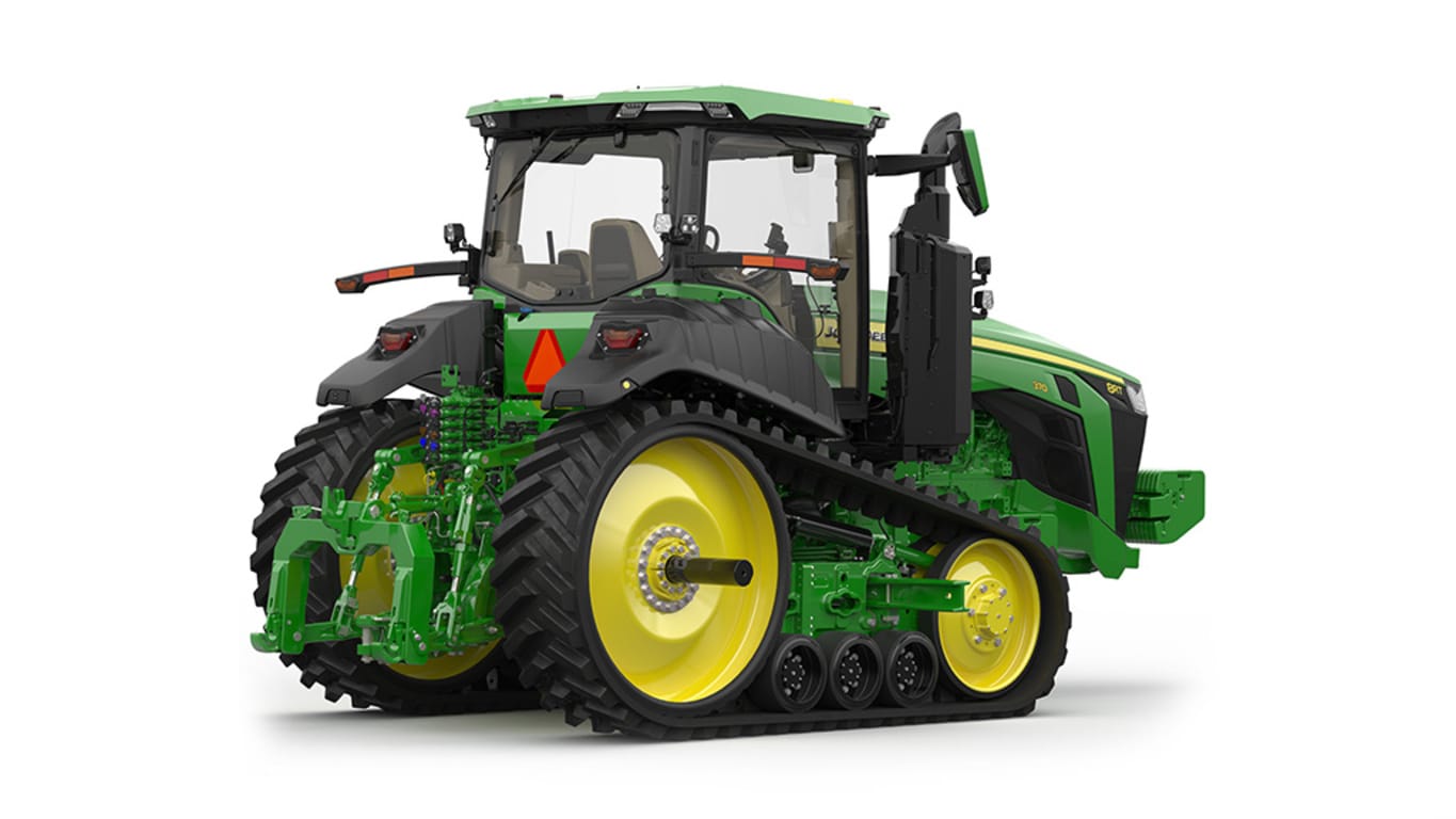 Image studio d'un tracteur vert à&nbsp;2&nbsp;chenilles vu de l'arrière droit sur fond blanc.