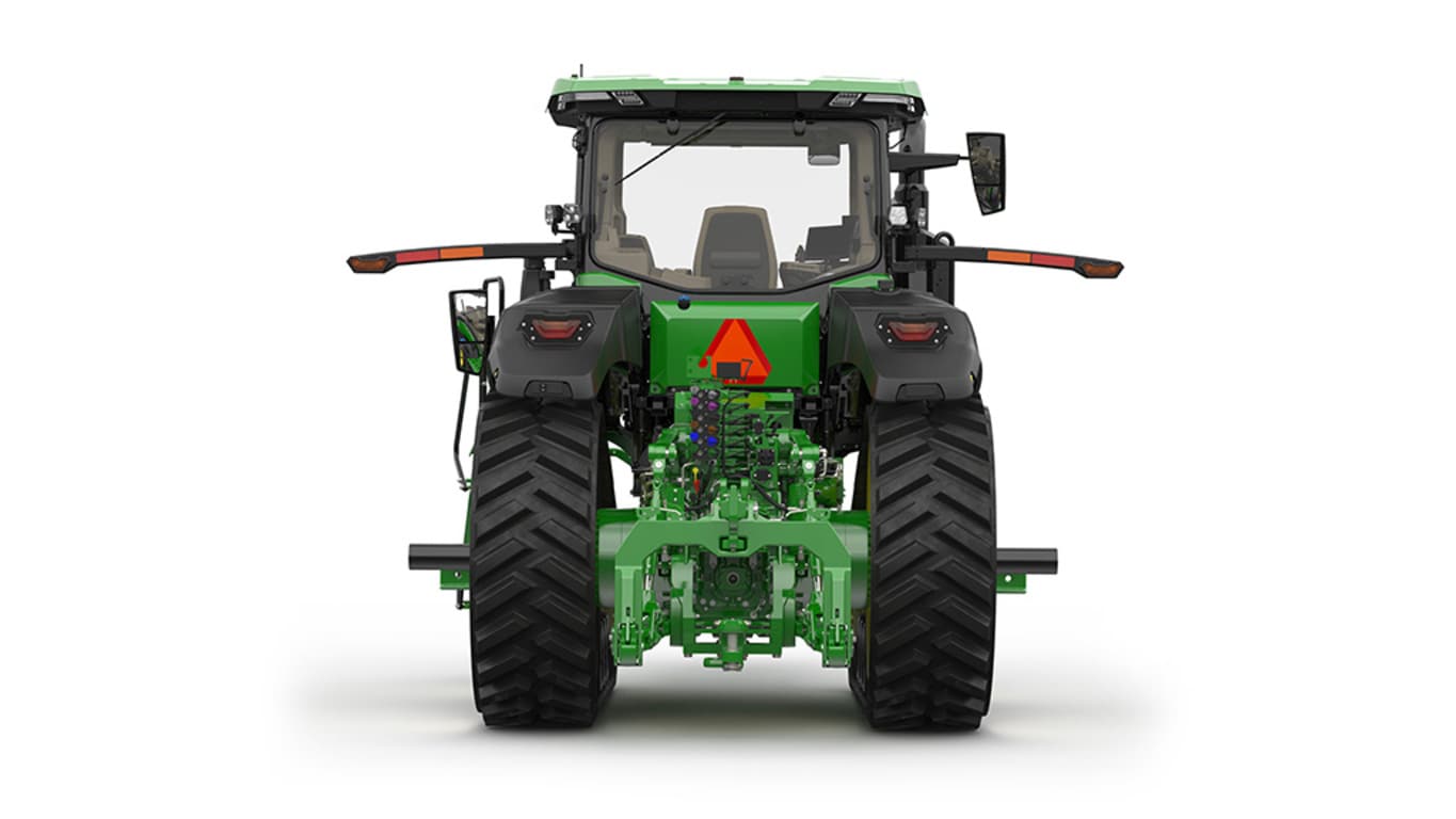 Image studio d'un tracteur vert à&nbsp;2&nbsp;chenilles vu de l'arrière sur fond blanc.