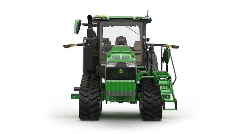 Front-facing studio shot of a 2-tracked green tractor on a white background.