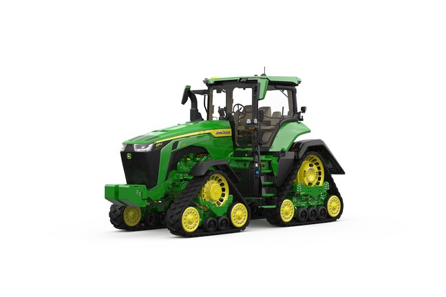 Front-left-facing studio shot of a 4-tracked green tractor on a white background.
