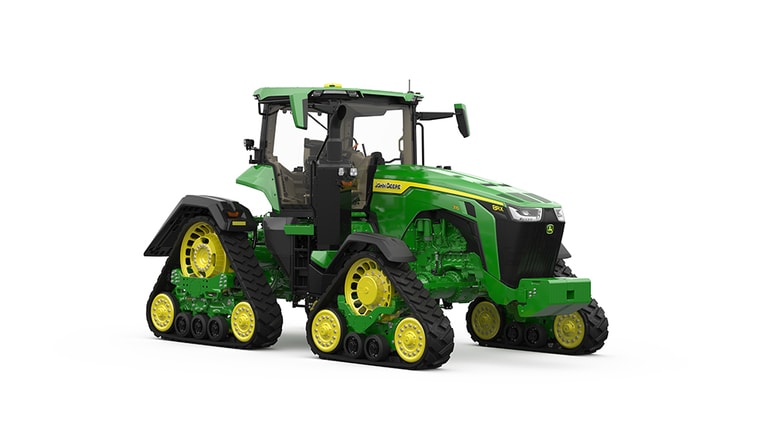 Front-right-facing studio shot of a 4-tracked green tractor on a white background.