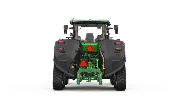 Image studio d'un tracteur vert à&nbsp;4&nbsp;chenilles vu de l'arrière sur fond blanc.
